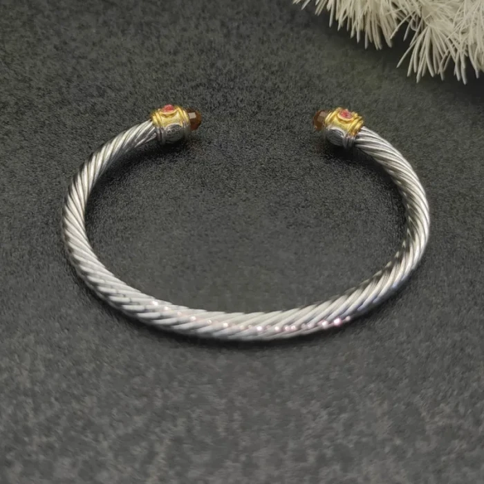 David Yurman 5mm Gold Cable Bracelet with Faceted Edge Design and Purple Diamonds