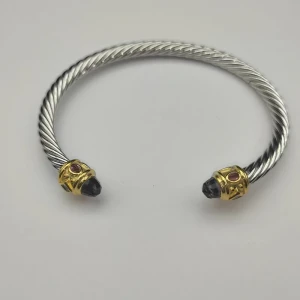 David Yurman 5mm Gold Cable Bracelet with Faceted Edge Design and Purple Diamonds