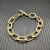 David Yurman Gold Cable Bracelet with Diamond-Set Rotating Clasp