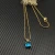 David Yurman Gold 11mm Four-Prong Blue Diamond Necklace