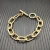 David Yurman Gold Cable Bracelet with Diamond-Set Rotating Clasp
